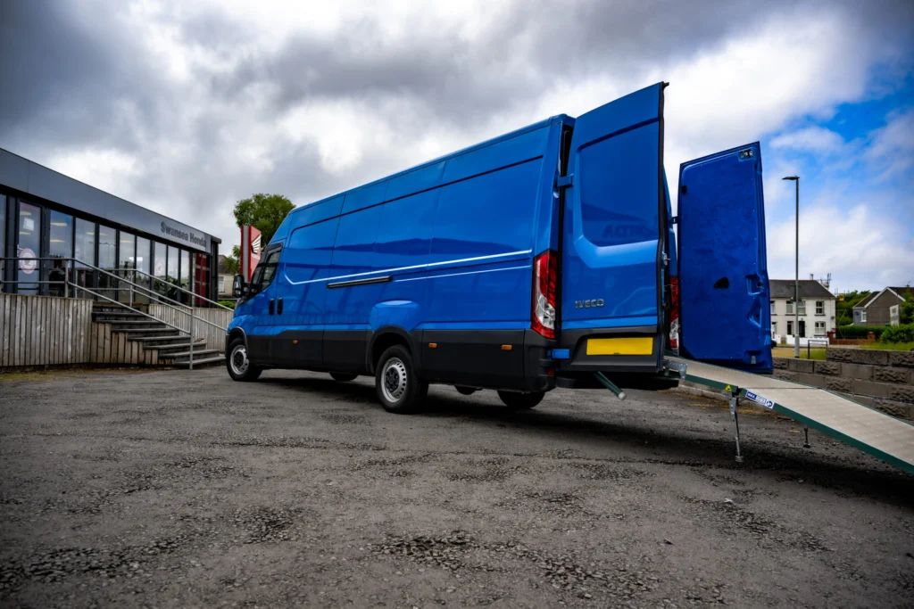 MoveMyBike van with its side door open and loading ramp down